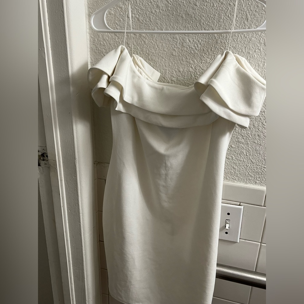 Brand new dress with tags still included. Short dress